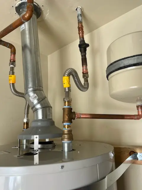 Water heater installation and plumbing repair in Titus Estates
